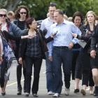 Prime Minister John Key talks to the media in Auckland on his way to vote in Saturday's general...