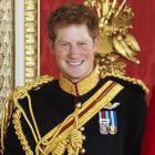 Prince Harry lived up to his larrikin expectation. Photo by AP