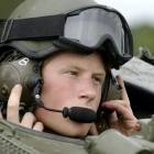 Prince Harry, seen here undergoing instruction in an armoured vehicle in 2007, has qualified as...