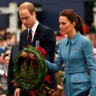 Prince William and his wife Catherine, Duchess of Cambridge, prepare to lay a wreath at the war...