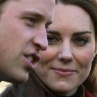Prince William and Kate Middleton speak to staff during a visit to the University of St Andrews,...
