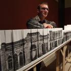 Printmaker Manu Berry displays his Harbour St streetscape. Photo by Sally Rae.