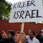 Pro-Palestinian Turks shout slogans "death to Israel" as they protest against Israel, at the...