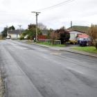 Problems with cracking in the road surface of  Dunbar Pl, Mosgiel, after roadworks. Photos by...
