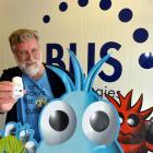 Prof John Tagg with his Blis K12 Throat Guard Daily probiotics. Photo by Stephen Jaquiery.