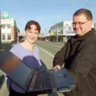 Project Clutha chairwoman Donna Carline and Rivernet computer technician Glenn Hutton check...