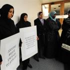 Protesters and onlookers outside a meeting organised for Islam Awareness Week at the University...