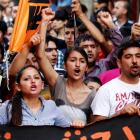 Protesters shout slogans against Turkey's Prime Minister Tayyip Erdogan as they march during a...