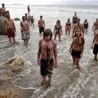 Protesters take part in an anti-oil exploration demonstration at Moeraki Beach yesterday,...