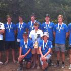 Proudly displaying their medals with coach Andrew Jolly are the Wakatipu Rowing Club under-18...