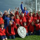 Pupils from Omakau School celebrate with the shield this week.