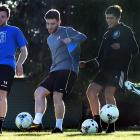 Putting in the hard yards ... Mosgiel premier players (from left) Matt Kelly, Isaac Snell, Rahan...