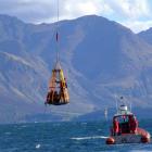 Dramatic demonstration . . . The Coastguard Queenstown boat arrives to pick up two men ‘‘rescued'...