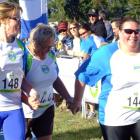 Sonja McNamara, Glenise McNamara and Vicki O’Brien unite as they approach the finish line. Photo...