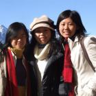 Chinese students (from left) Carol Mengxi Lin, Rachel Yunqi Zeng and Zoe Zuo stroll through...