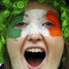 An Ireland supporter cheers before their Rugby World Cup quarter-final match against Wales at...