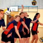 Queen's High School year 10 pupils practising their volleyball skills yesterday are (from left)...