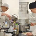 Queens High School pupil's Courtney Dowdall (18, left) and Sharna-Lee Te Waiti (17) cook pasta...