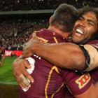Queensland's Corey Parker and Sam Thaiday celebrate their State of Origin series victory over New...