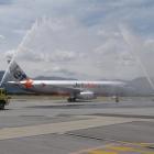 Queenstown Airport rescue tenders welcome its first Jetstar International flight yesterday, ...