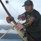 Queenstown bowhunter Paul Mettmann, who wants to start a bowhunting club in the resort, shows off...