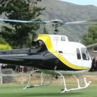 Queenstown helicopter pilot Mitchell Gameren's coffin is flown in for a funeral service at Lake...