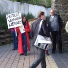 Queenstown Lakes District Chief executive Adam Feeley passes Protect Wanaka Library protesters,...