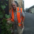 Queenstown Lakes District Council project manager Lane Vermaas with the newly-planted grape vines...