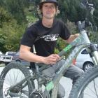 Queenstown Mountain Bike Club president Tom Hey with the bike he intends to sell - among many...