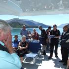 Queenstown's Brian Hancock reacts to seeing his surprise birthday cake arrive  on the top deck....