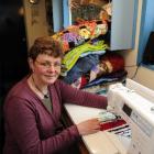 Quilter Debbie Pettinger works on her latest creation in her home studio, in Dunedin. Photo by...