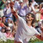 Rafael Nadal of Spain celebrates defeating Novak Djokovic of Serbia in their men's singles semi...