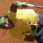 Rafael Nadal of Spain serves the ball to compatriot David Ferrer during the final of the Monte...