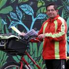 Rain, hail and shine, postie John Kingan has been on the road delivering post to Mosgiel...