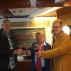 Real Journeys chief executive Richard Lauder, Joan Hall-Jones and David Hall-Jones toast to the...