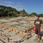 Rebuild committee convener Scott Weatherall on the build site at the new Brighton Surf Life...