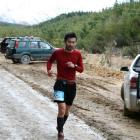Rei Ishikawa (30), of Dunedin, strides along during the 50km race.