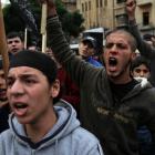 Relatives of Lebanese who had gone missing in Syria chant slogans during a protest to enquire...