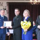Relieving District Commander Superintendent Richard Chambers (left) presents Oamaru-based...