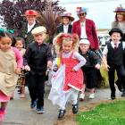 Reliving days gone by, are Rachel Reynolds Kindergarten children (from left) Ella Matheson (4),...