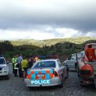 Rescue crews on the bank of the Clutha River near Roxburgh. Photo by Diane Brown