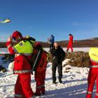 Rescue personnel prepare to go to the mountain area near Kafjord, Norway where an avalanche...