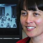 Researcher Jane McCabe reflects on a photograph depicting her grandmother, Lorna Peters (standing...