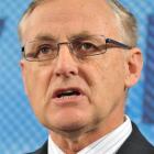 Reserve Bank governor Alan Bollard urges New Zealand to not pull the shutters down. Photo by NZPA.