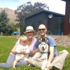 Reunited in Kingston yesterday with their dog Wolf are Ryan, Kirsteen and Willow (1) Watt. Photo...