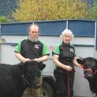 Richard and Angela Stevens with some of their Dexter cattle. Photo supplied.