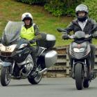 Ride Forever instructor Pete Daly, of Christchurch, teaches reporter Shawn McAvinue on the urban...