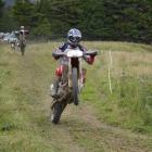 Riders lift their from wheels under power during the Clinton-Kaiwera Trail Ride, near Clinton on...