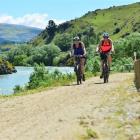 Riders on the  Clutha Gold Trail near the Roxburgh Dam. Photo by Peter McIntosh.