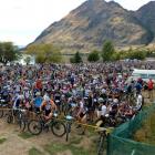 Riders prepare for the start of the mountain bike section of the Motatapu multisport race at...